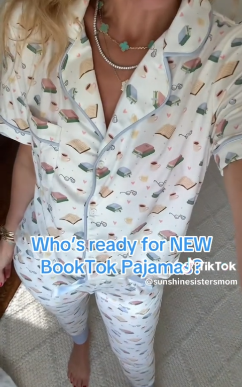 Screenshot from @sunshinesistersmom TikTok of Jordann wearing BookTok PJs