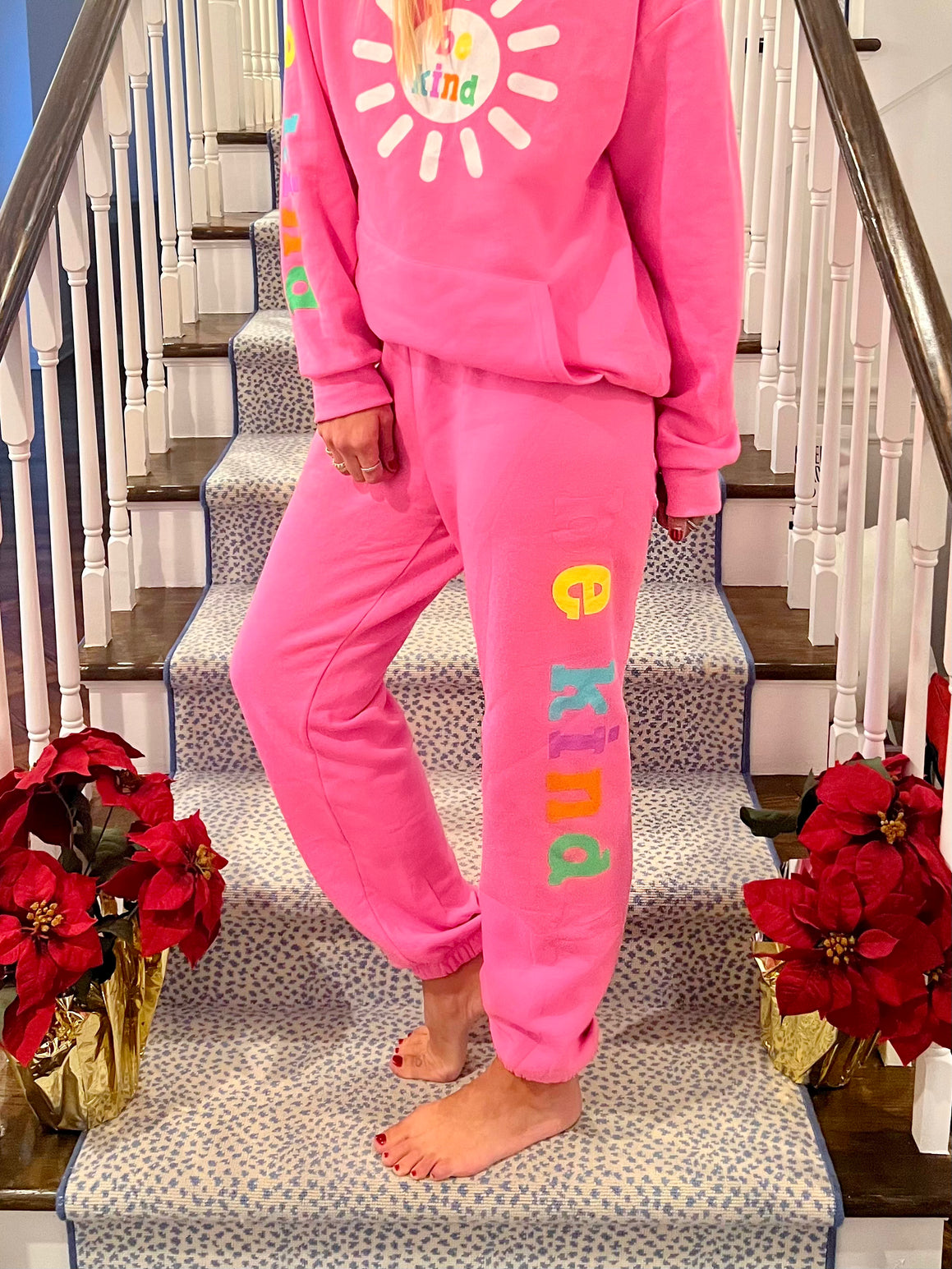 Red top pink sweatpants