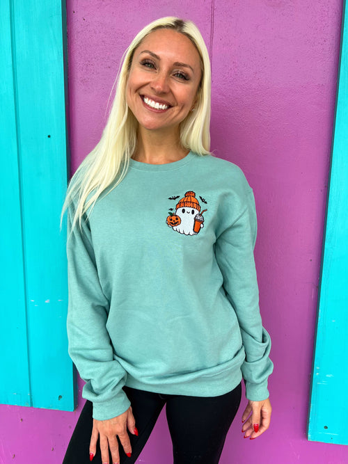 Kaitlyn wearing a size small Pumpkin Spicy Ghost Sweatshirt by Sunshine Sisters